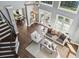 Open concept living room with high ceilings, many windows, hardwood floors, and comfortable seating at 900 Crossfire Nw Rdg, Marietta, GA 30064