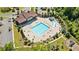 Aerial view of the community pool and recreation area, surrounded by lush landscaping at 2315 Saddle Brook Trce, Cumming, GA 30040