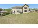 Expansive backyard featuring a patio area perfect for outdoor dining and entertaining at 2315 Saddle Brook Trce, Cumming, GA 30040