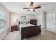 Cozy bedroom with carpet, fan, closet and natural light at 2315 Saddle Brook Trce, Cumming, GA 30040