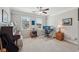 Bedroom featuring a work space, large windows, and neutral walls for a comfortable feel at 2315 Saddle Brook Trce, Cumming, GA 30040