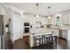 Bright kitchen with granite counters, stainless appliances and a center island with barstool seating at 2315 Saddle Brook Trce, Cumming, GA 30040