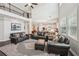 Open-concept living area with hardwood floors, vaulted ceilings, and ample natural light at 2315 Saddle Brook Trce, Cumming, GA 30040