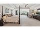 Spacious main bedroom boasts tray ceilings, plush carpeting, and an adjoined sitting room at 2315 Saddle Brook Trce, Cumming, GA 30040