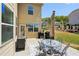 Charming patio area with outdoor seating and a grill, great for summer barbecues at 2315 Saddle Brook Trce, Cumming, GA 30040