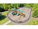 Community playground featuring climbing structures, slides, and swings; perfect for Gathering fun and outdoor activities at 2315 Saddle Brook Trce, Cumming, GA 30040