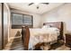Bedroom features wood-look floors and a ceiling fan at 2376 Falls River Dr, Lithia Springs, GA 30122