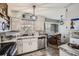 The kitchen features stainless steel appliances and natural light at 2376 Falls River Dr, Lithia Springs, GA 30122