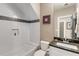 Modern bathroom with subway tile, soaking tub, and stylish vanity at 286 Norwood Ne Ave, Atlanta, GA 30317