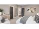 Stylish bedroom showcasing a decorative bed, dark doors, and tasteful artwork at 286 Norwood Ne Ave, Atlanta, GA 30317