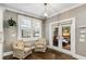 Breakfast nook with windows and sliding glass doors leading to the patio at 286 Norwood Ne Ave, Atlanta, GA 30317