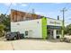 Exterior view of a building with a juice and smoothie shop and a parking area at 286 Norwood Ne Ave, Atlanta, GA 30317