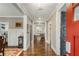 Elegant hallway featuring hardwood floors, neutral paint and sophisticated trim details at 286 Norwood Ne Ave, Atlanta, GA 30317