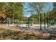Outdoor fitness area with various exercise equipment in a park setting at 286 Norwood Ne Ave, Atlanta, GA 30317