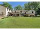 Extensive backyard showcasing the outdoor space and covered patio at 299 Saint Marys Nw Ln, Marietta, GA 30064
