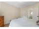 Bedroom with hardwood floors and door to a bright, adjacent space at 299 Saint Marys Nw Ln, Marietta, GA 30064