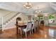 Elegant dining room with hardwood floors, coffered ceiling and seating for eight at 299 Saint Marys Nw Ln, Marietta, GA 30064
