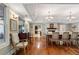 Dining room with hardwood floors, fireplace, and large windows at 299 Saint Marys Nw Ln, Marietta, GA 30064