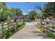 Long driveway leads to this well-maintained home, complemented by a lush lawn and mature trees in the front and to the side at 299 Saint Marys Nw Ln, Marietta, GA 30064