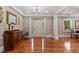Elegant foyer with hardwood floors, decorative chandelier, and traditional wooden accents at 299 Saint Marys Nw Ln, Marietta, GA 30064