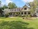 Stunning home with lush green lawn, mature landscaping, and inviting curb appeal at 299 Saint Marys Nw Ln, Marietta, GA 30064