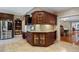 Gourmet kitchen featuring custom cabinetry, stainless steel appliances, and a corner breakfast nook at 299 Saint Marys Nw Ln, Marietta, GA 30064
