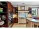 This kitchen boasts stainless steel appliances, granite countertops, and plenty of cabinet space at 299 Saint Marys Nw Ln, Marietta, GA 30064