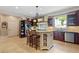 Bright and airy kitchen with a central island, stainless appliances, and ample storage space at 299 Saint Marys Nw Ln, Marietta, GA 30064