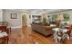 Inviting living room with hardwood floors, comfortable seating, and well-placed decor at 299 Saint Marys Nw Ln, Marietta, GA 30064