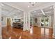 Cozy living room featuring hardwood floors, coffered ceiling, and built-in shelving at 299 Saint Marys Nw Ln, Marietta, GA 30064