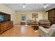 Spacious living room with tile floors, modern lighting, and a decorative area rug at 299 Saint Marys Nw Ln, Marietta, GA 30064
