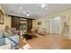 Inviting living room features comfortable sofas, tile floors, a decorative rug, and sliding barn doors at 299 Saint Marys Nw Ln, Marietta, GA 30064