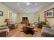 Spacious living room with tile floors, stylish furniture, and ceiling fans to keep you cool at 299 Saint Marys Nw Ln, Marietta, GA 30064