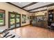 The Personal Cave features exposed beam ceiling, wood floors, bar with natural light at 299 Saint Marys Nw Ln, Marietta, GA 30064