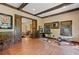 This Personal Cave features exposed beam ceiling, wood floors, a bar, and workout equipment at 299 Saint Marys Nw Ln, Marietta, GA 30064