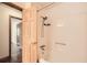 Bathroom featuring a bath tub with shower at 1766 Scholar Dr, Lawrenceville, GA 30044