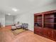 Inviting living room with hardwood floors, built-in shelving, and comfortable seating at 2402 Jasmine Glen Dr, Buford, GA 30519