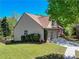 Well-maintained home with a two-car garage, a neat lawn, and partial stone facade at 2402 Jasmine Glen Dr, Buford, GA 30519