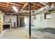 Unfinished basement with exposed beams and cinder block walls providing a blank canvas at 2645 Davenport Rd, Duluth, GA 30096
