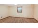Bright bedroom with neutral walls, plush carpet, and natural light from the window, offering a comfortable retreat at 2645 Davenport Rd, Duluth, GA 30096