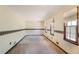 Spacious carpeted bedroom with natural light from multiple windows at 2645 Davenport Rd, Duluth, GA 30096