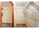Spacious walk-in closet with ample storage shelves, offering an organized and convenient storage solution at 2645 Davenport Rd, Duluth, GA 30096