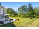 Landscaped backyard with patio and seating, perfect for enjoying the outdoors at 4188 Fawn Ivy Ln, Marietta, GA 30064