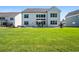 Spacious backyard with a patio, table and umbrella, perfect for outdoor entertaining at 4188 Fawn Ivy Ln, Marietta, GA 30064