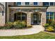 Inviting front porch with stone accents and a beautifully landscaped walkway to the front door at 4188 Fawn Ivy Ln, Marietta, GA 30064