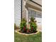 Decorative planters filled with flowers and greenery adorn the exterior of the home at 4188 Fawn Ivy Ln, Marietta, GA 30064