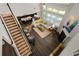 Open-concept living area with hardwood floors, ample natural light, and stairs to the left at 4188 Fawn Ivy Ln, Marietta, GA 30064