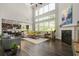 Spacious living room with soaring ceilings, fireplace, and open kitchen perfect for entertaining at 4188 Fawn Ivy Ln, Marietta, GA 30064