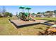 Community playground with slides, climbing structures, and a wood chip safety surface at 4188 Fawn Ivy Ln, Marietta, GA 30064