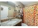 Bathroom vanity with a decorative shower curtain at 102 Hill Crest Cir, Hiram, GA 30141